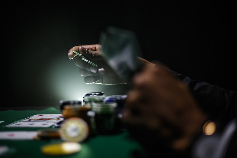 selective focus photography of poker chips